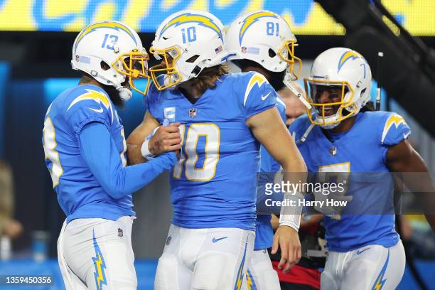 Keenan Allen of the Los Angeles Chargers and Justin Herbert of the Los Angeles Chargers celebrate after a touchdown against the Kansas City Chiefs...