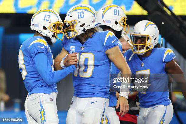 Keenan Allen of the Los Angeles Chargers and Justin Herbert of the Los Angeles Chargers celebrate after a touchdown against the Kansas City Chiefs...