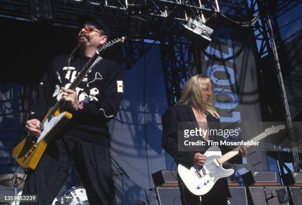 Rick Nielsen and Robin Zander of Cheap Trick perform during Lollapalooza at Winnebago County Fairgrounds on June 30, 1996 in Rockford, Illinois.