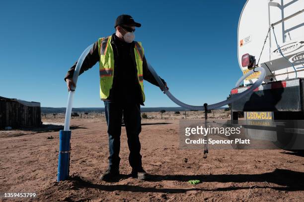 Water pump is repaired outside of a home on the Navajo Nation on December 16, 2021 in Thoreau, New Mexico. Due to a legacy of poverty,...