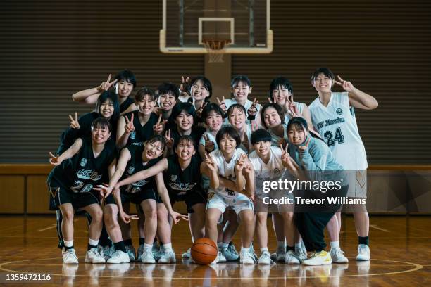 team of young female college basketball players - sports activity ストックフォトと画像