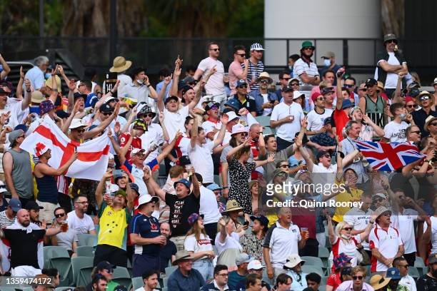 English fans cheer during day two of the Second Test match in the Ashes series between Australia and England at the Adelaide Oval on December 17,...