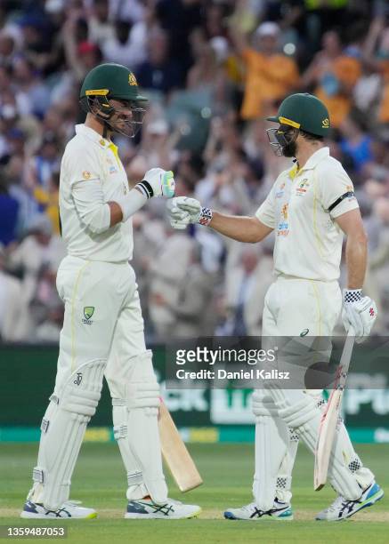 Mitchell Starc of Australia and Michael Neser of Australia congratulate each other during day two of the Second Test match in the Ashes series...