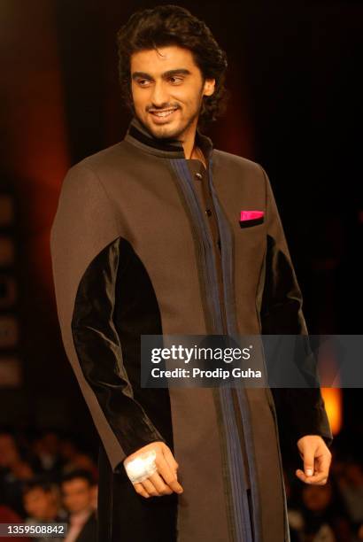 Arjun Kapoor walks the ramp for Manish Malhotra's creation at the Shabana Azmi's charity fundraising fashion show 'Mijwan' on September 03,2012 in...