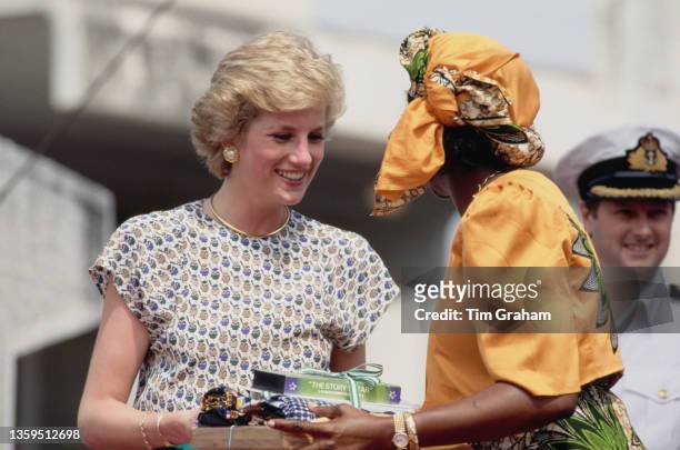 British Royal Diana, Princess of Wales , wearing an Alistair Blair dress, with Maryam Babangida, the wife of the President of Nigeria, at the 'Better...