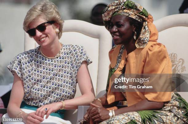 British Royal Diana, Princess of Wales , wearing an Alistair Blair dress, sits beside Maryam Babangida, the wife of the President of Nigeria, at the...