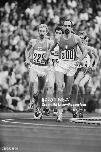 Franco Arese of Italy leads, from left, Pekka Vasala of Finland and Brendan Foster of Great Britain in semifinal 3 of the Men's 1500 metres event at...