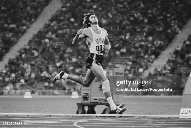 Decathlete Bruce Jenner of the United States in action in the 1500m final discipline of the Men's decathlon event at the 1972 Summer Olympics inside...