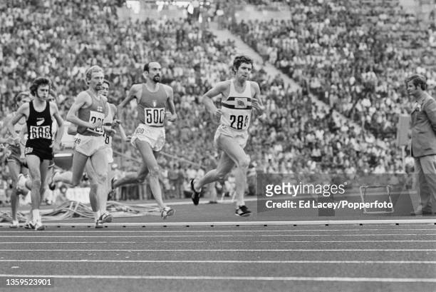 Brendan Foster of Great Britain leads Franco Arese of Italy , Pekka Vasala of Finland and Rod Dixon of New Zealand in semifinal 3 of the Men's 1500...