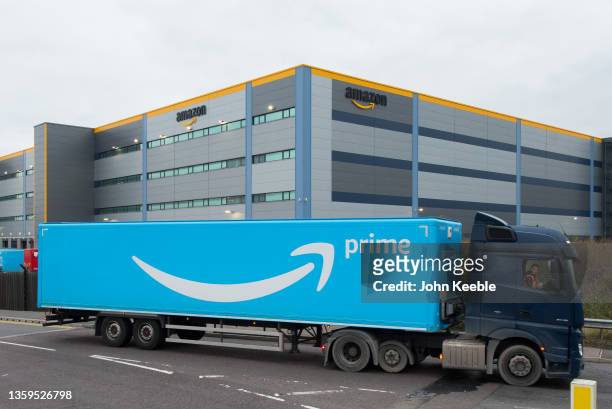An amazon Prime HGV Lorry drives out of the Amazon Fulfilment Centre on December 16, 2021 in Tilbury, England.