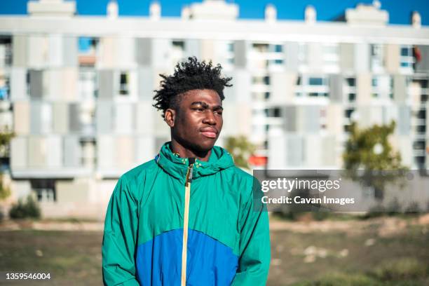 portrait of black african american boy posing seriously. - modern boy hipster stock pictures, royalty-free photos & images