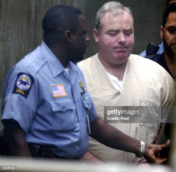 Michael Skakel is escorted out of Norwalk Superior Court after being sentenced to 20 years to life in prison for the 1975 murder of his neighbor...