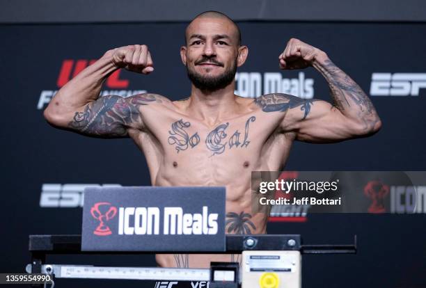 Cub Swanson poses on the scale during the UFC Fight Night weigh-in at UFC APEX on December 17, 2021 in Las Vegas, Nevada.