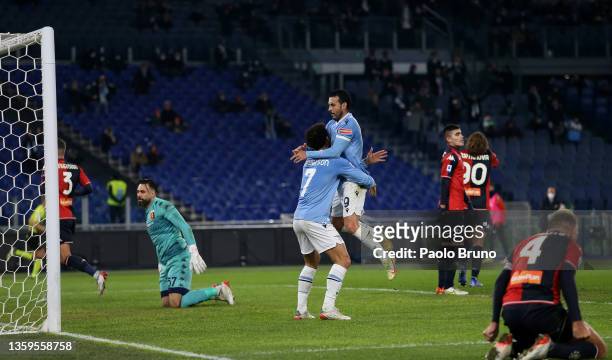 Pedro of Lazio celebrates with Felipe Anderson of Lazio after scoring his side's opening goal during the Serie A match between SS Lazio and Genoa CFC...