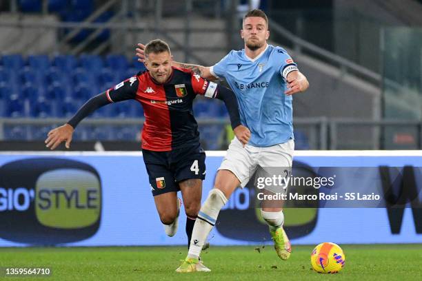 Sergej Milinkovic Savic of SS Lazio competes for the ball with Domenico Criscito of Genoa CFC during the Serie A match between SS Lazio and Genoa CFC...