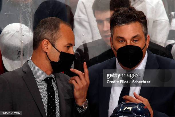 Florida Panthers Assistant Coach Derek MacKenzie chats with Interim Head Coach Andrew Brunette during a break in the action against the Los Angeles...