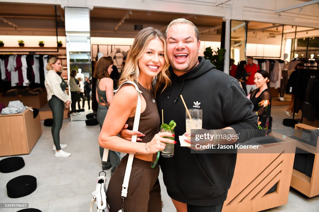 Christopher Richards and guest attend the opening party for Alo