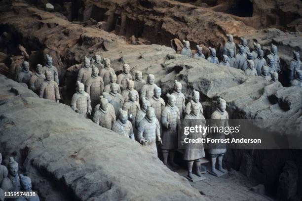 View across the excavated Terracotta Army in the tomb of China's first emperor, Qin Shi Huang Di, Xi'an, Shaanxi, China, October 1986. The warrior...