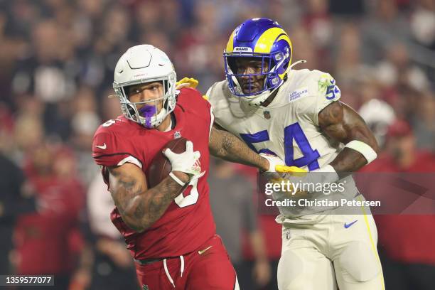 Running back James Conner of the Arizona Cardinals rushes the football against Leonard Floyd of the Los Angeles Rams during the NFL game at State...
