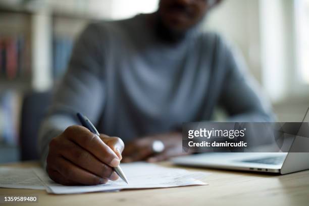 man working - paperwork stock pictures, royalty-free photos & images