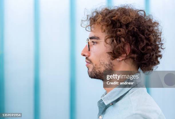 profile portrait of a casual business working at the office - curly hair profile stock pictures, royalty-free photos & images