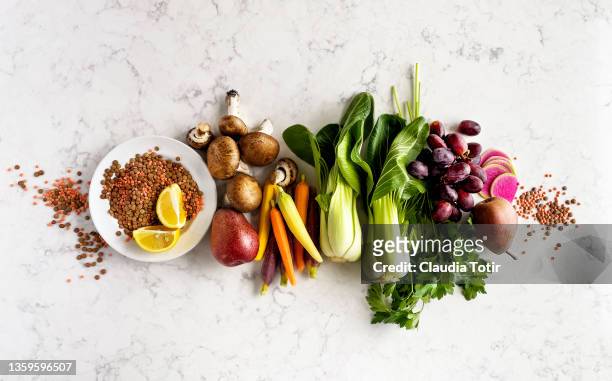 food ingredients on white, marble background - obst stock-fotos und bilder