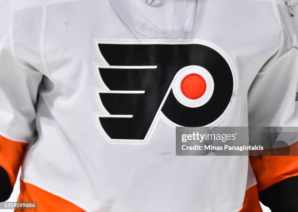 Detailed view of the Philadelphia Flyers' logo seen on a jersey during overtime against the Montreal Canadiens at Centre Bell on December 16, 2021 in...