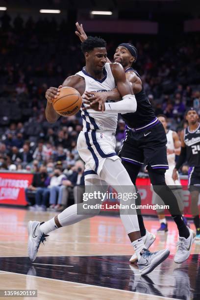 Jaren Jackson Jr. #13 of the Memphis Grizzlies is fouled by Maurice Harkless of the Sacramento Kings in the second quarter at Golden 1 Center on...