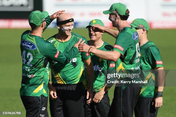 Central Stags players celebrate a Seth Rance wicket during the Super Smash T20 match between the Central Stags and the Otago Volts at McLean park on...