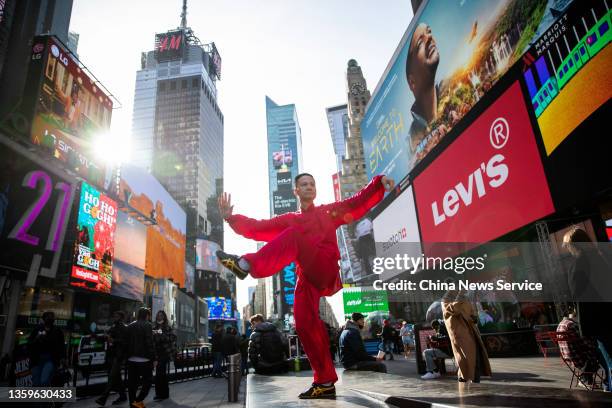 Former world champion Chen Sitan practices Tai Chi to mark the first anniversary of its listing as a UNESCO world intangible cultural heritage in...