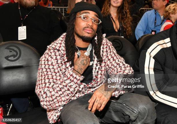 Rapper Quavo of Migos attends the game between the Denver Nuggets and the Atlanta Hawks at State Farm Arena on December 17, 2021 in Atlanta, Georgia.