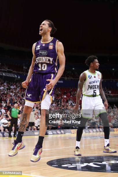 Xavier Cooks of the Kings celebrates after slam dunking during the round three NBL match between Sydney Kings and South East Melbourne Phoenix at...