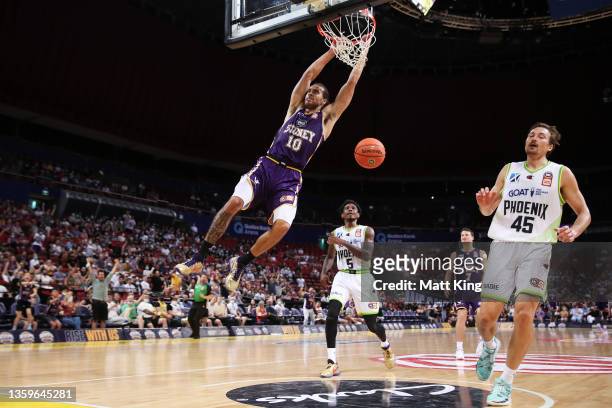 Xavier Cooks of the Kings slam dunks during the round three NBL match between Sydney Kings and South East Melbourne Phoenix at Qudos Bank Arena on...