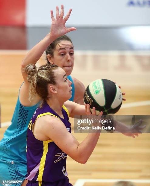 Lily Scanlon of the Boomers competes against Jenna O’Hea of the Flyers during the round three WNBL match between Southside Flyers and Melbourne...