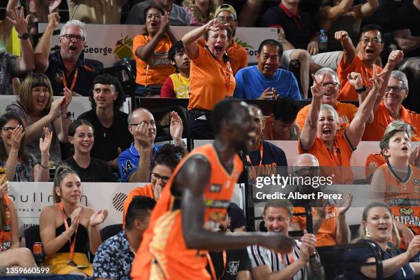 General view is seen of fans celebrating after Majok Deng of the Taipans scored a three during the round three NBL match between the Cairns Taipans...