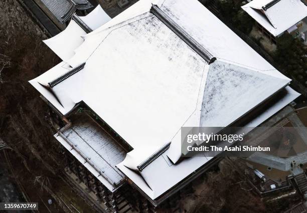 In this aerial image, Kiyomizudera Temple is covered with snow on December 18, 2021 in Kyoto, Japan.