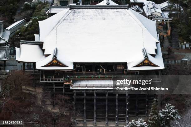 In this aerial image, Kiyomizudera Temple is covered with snow on December 18, 2021 in Kyoto, Japan.