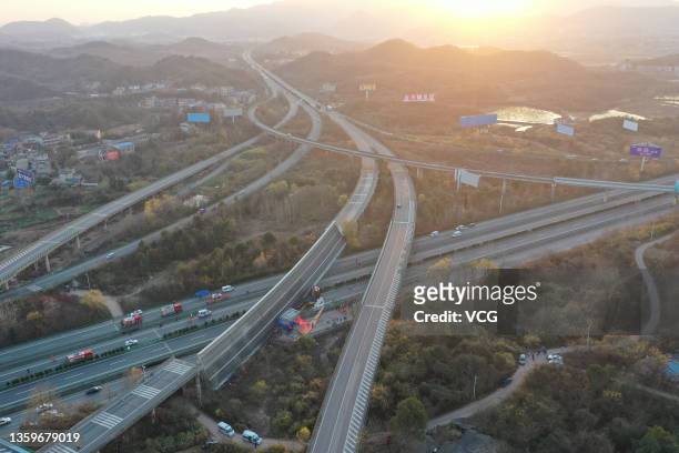 Aerial view of a collapsed bridge is seen on December 18, 2021 Ezhou, Hubei Province of China. Three people were killed and four others injured after...