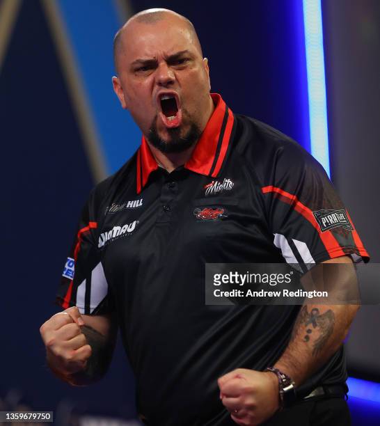 Raymond Smith of Australia celebrates during Day Four of the PDC William Hill World Darts Championship at Alexandra Palace on December 18, 2021 in...