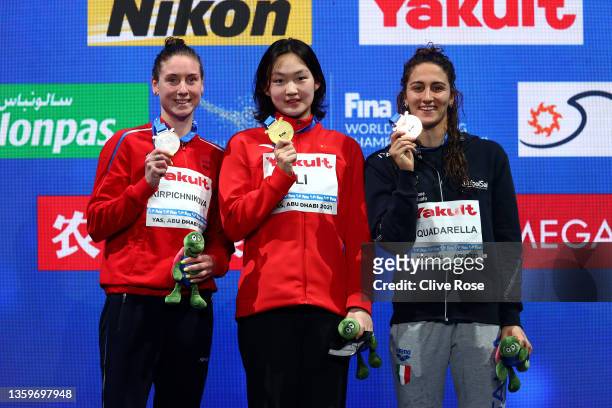 Anastasiia Kirpichnikova of Russia poses with the silver medal, Bingjie Li of China poses with the gold medal and Simona Quadarella of Italy poses...