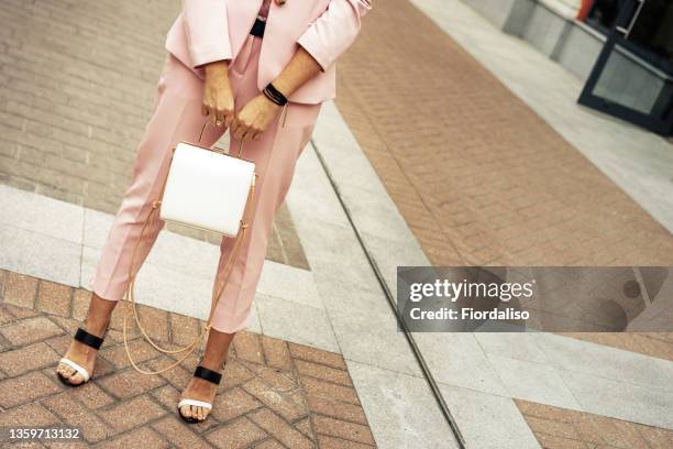 a elegant business woman - pink pants stock pictures, royalty-free photos & images