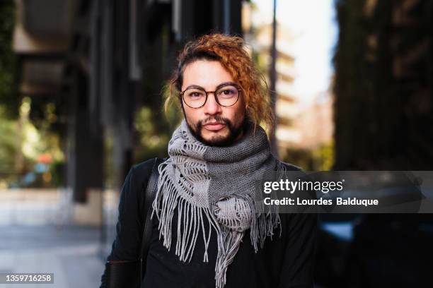 sweet young man looking at camera - nb stock pictures, royalty-free photos & images