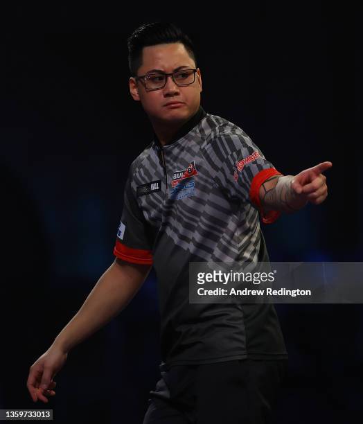 Rowby-John Rodriguez of Austria celebrates winning a set during Day Four of the 2021/22 PDC William Hill World Darts Championship at Alexandra Palace...