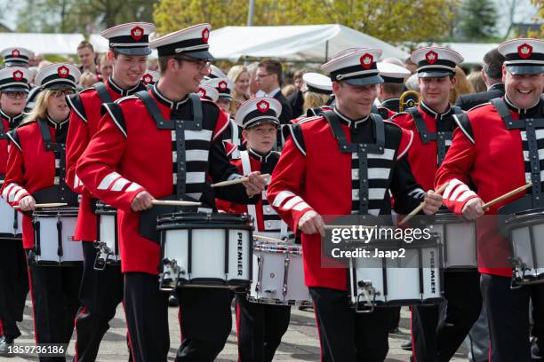 members of the local fanfare orchestra marching at koninginnedag - fanfar bildbanksfoton och bilder