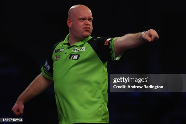 Michael van Gerwen of The Netherlands celebrates winning his match during Day Four of the 2021/22 PDC William Hill World Darts Championship at...