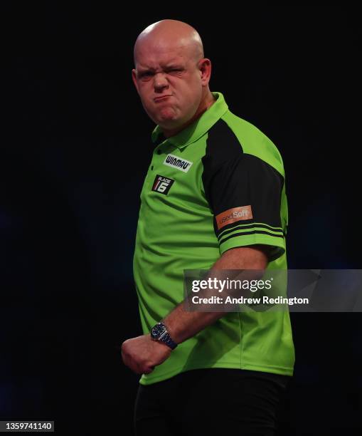 Michael van Gerwen of The Netherlands celebrates during Day Four of the 2021/22 PDC William Hill World Darts Championship at Alexandra Palace on...