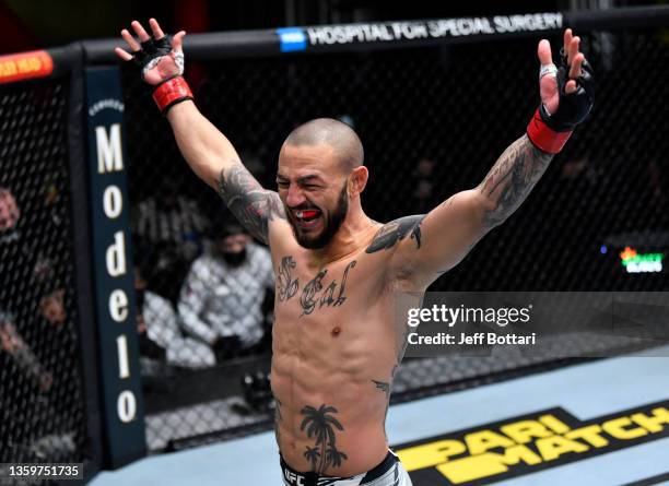 Cub Swanson celebrates after his knockout victory over Darren Elkins in their featherweight fight during the UFC Fight Night event at UFC APEX on...