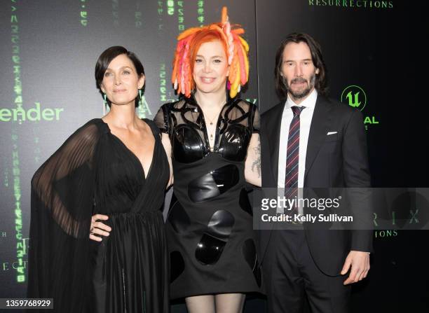 Carrie-Anne Moss, Lana Wachowski, and Keanu Reeves attend "The Matrix Resurrections" Red Carpet U.S. Premiere Screening at The Castro Theatre on...