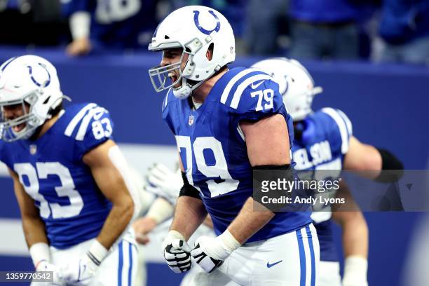 Eric Fisher of the Indianapolis Colts reacts after a touchdown during the fourth quarter against the New England Patriots at Lucas Oil Stadium on...