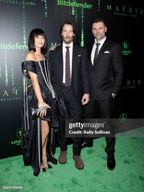 Ellen Hollman, Keanu Reeves, and Stephen Dunlevy attend "The Matrix Resurrections" Red Carpet U.S. Premiere Screening at The Castro Theatre on...